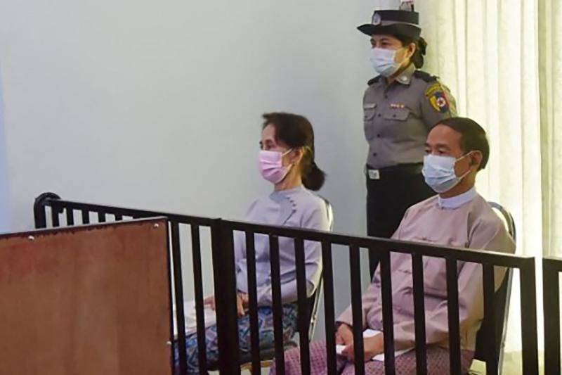 This file handout photo taken on May 24, 2021 and released by Myanmar's Ministry of Information on May 26 shows detained civilian leader Aung San Suu Kyi and detained president Win Myint during their first court appearance in Naypyidaw since the military detained them in a coup on Feb 1. (AFP) This file handout photo taken on May 24, 2021 and released by Myanmar's Ministry of Information on May 26 shows detained civilian leader Aung San Suu Kyi and detained president Win Myint during their first court appearance in Naypyidaw since the military detained them in a coup on Feb 1. (AFP)