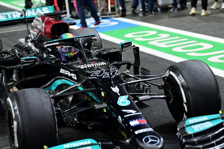 Mercedes' Lewis Hamilton drives in the parc ferme after winning the Saudi Arabian Grand Prix. Mercedes' Lewis Hamilton drives in the parc ferme after winning the Saudi Arabian Grand Prix.
