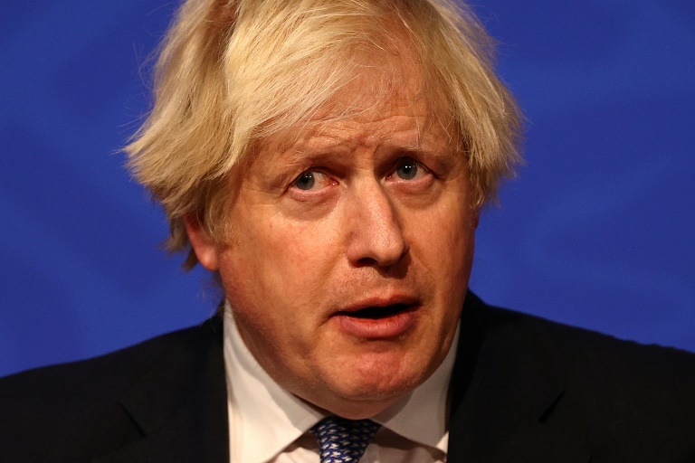 Johnson orders Christmas party probe as aide quits