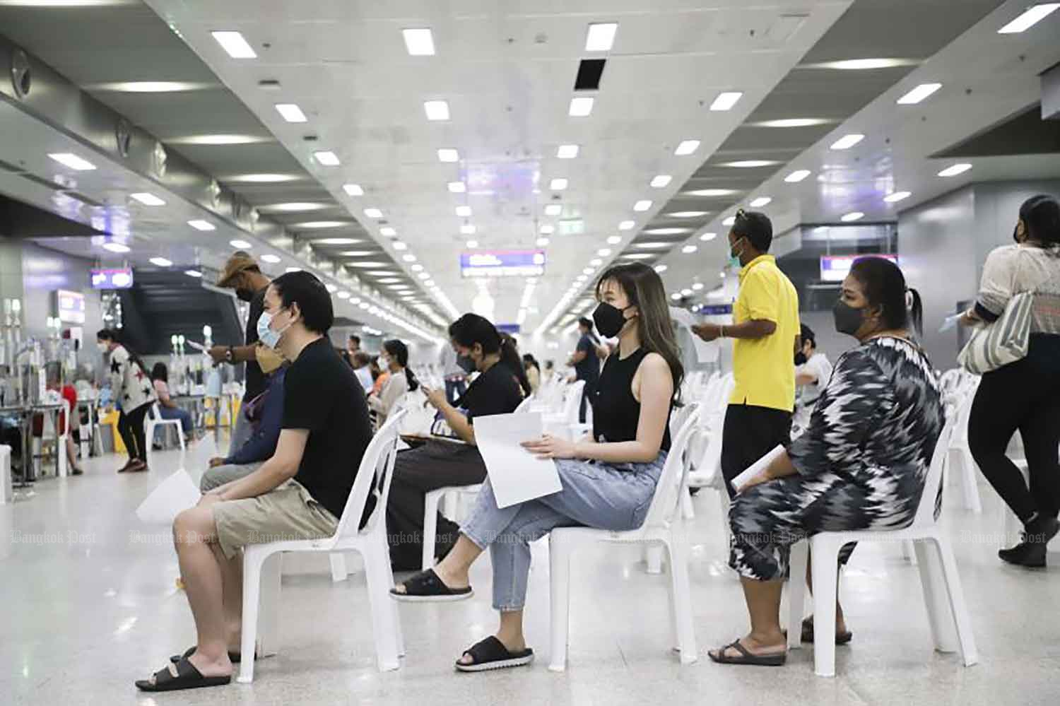 People queue for Covid-19 vaccination at Bang Sue Grand Station in Bangkok. (Photo: Pattarapong Chatpattarasill)