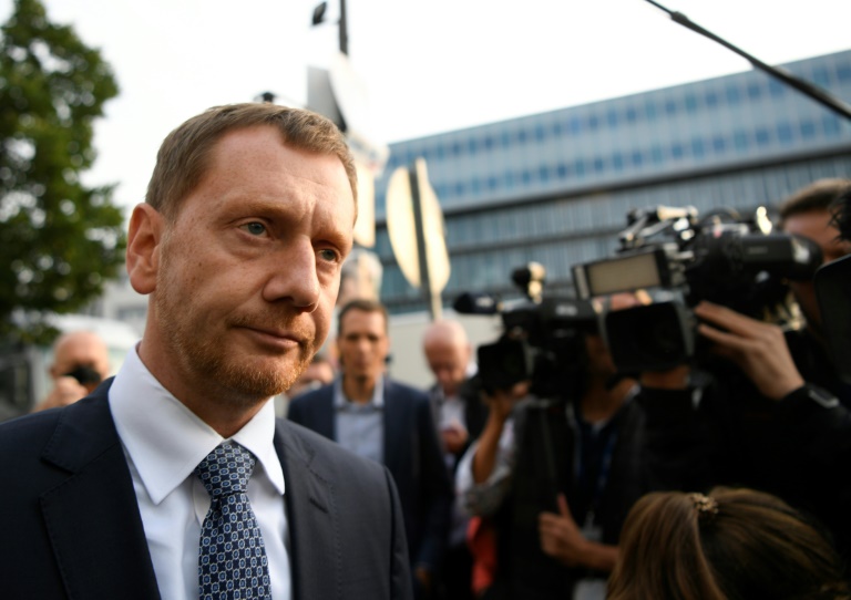 German police have launched an operation after death threats were issued in an anti-vaccine chat group against Saxony state premier Michael Kretschmer. German police have launched an operation after death threats were issued in an anti-vaccine chat group against Saxony state premier Michael Kretschmer.