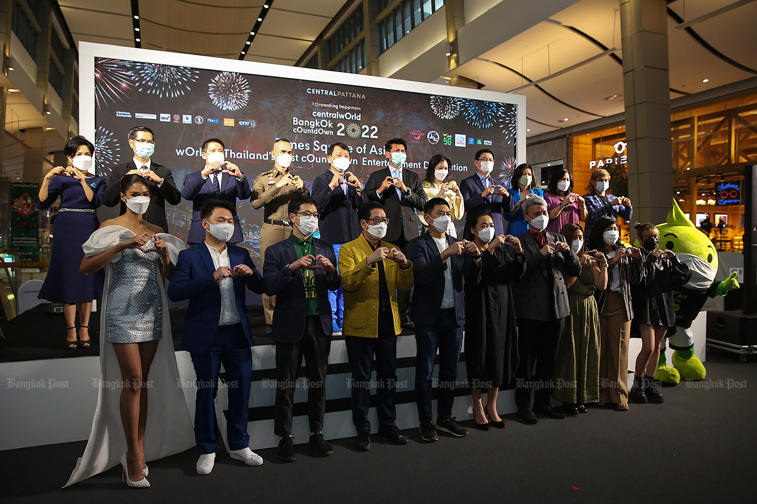 Deputy Minister of Public Health Sathit Pitutecha, sixth from left on the stage, attends an event announcing 'centralwOrld bangkOk cOuntdOwn 2022' at CentralWorld on Wednesday. (Photo: Varut Hiranyathep) Deputy Minister of Public Health Sathit Pitutecha, sixth from left on the stage, attends an event announcing 'centralwOrld bangkOk cOuntdOwn 2022' at CentralWorld on Wednesday. (Photo: Varut Hiranyathep)