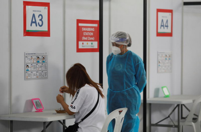 Singapore finds first local Omicron cluster, expects more cases - Vimarsana News