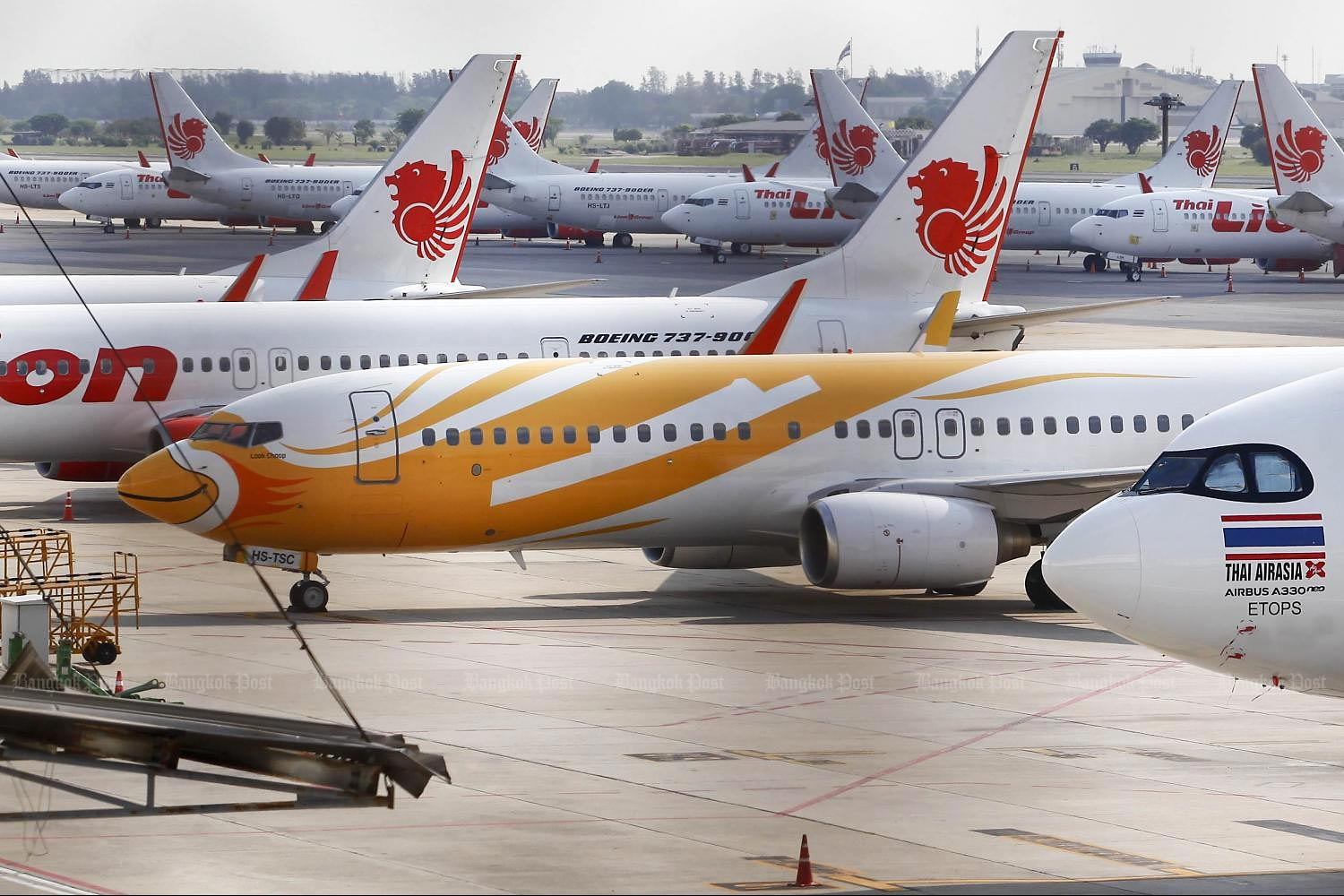 Aircraft of AirAsia, Nok Air and Thai Lion Air at Don Mueang airport. (Photo by Pattarapong Chatpattarasill)