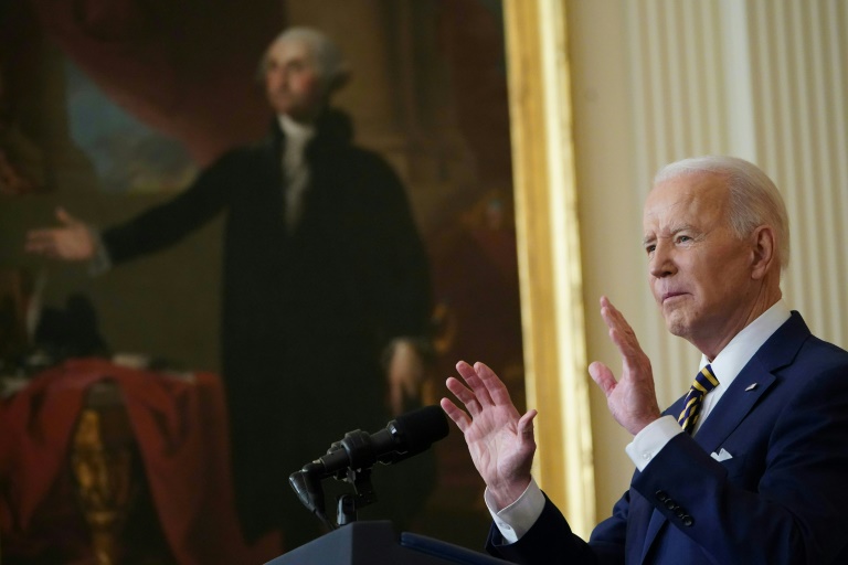 Defiant Biden touts first year, vows to reconnect with voters