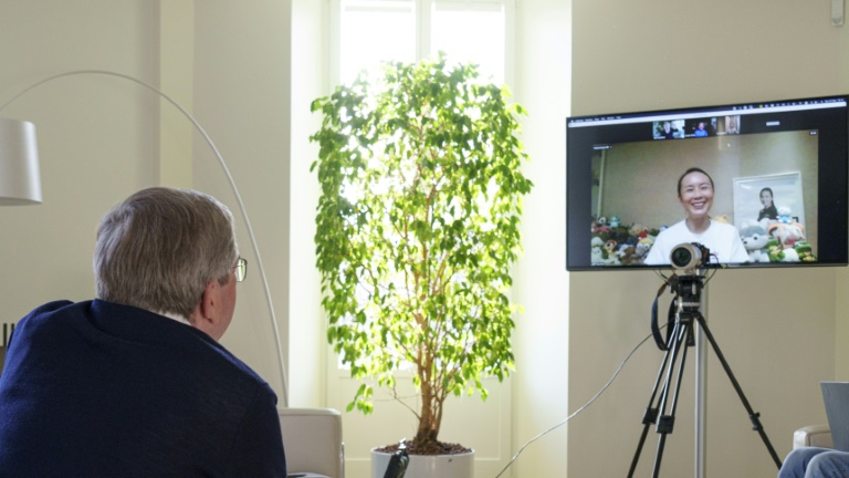 A handout photo posted on the International Olympic Committee website on Nov 21, 2021 shows IOC president Thomas Bach holding a video call with Chinese tennis star Peng Shuai.