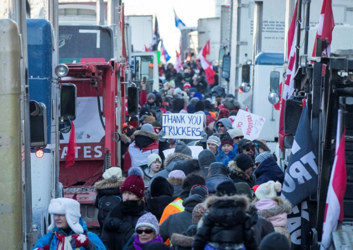 Hundreds of truckers pour into Ottawa to protest vaccine requirements - Vimarsana News