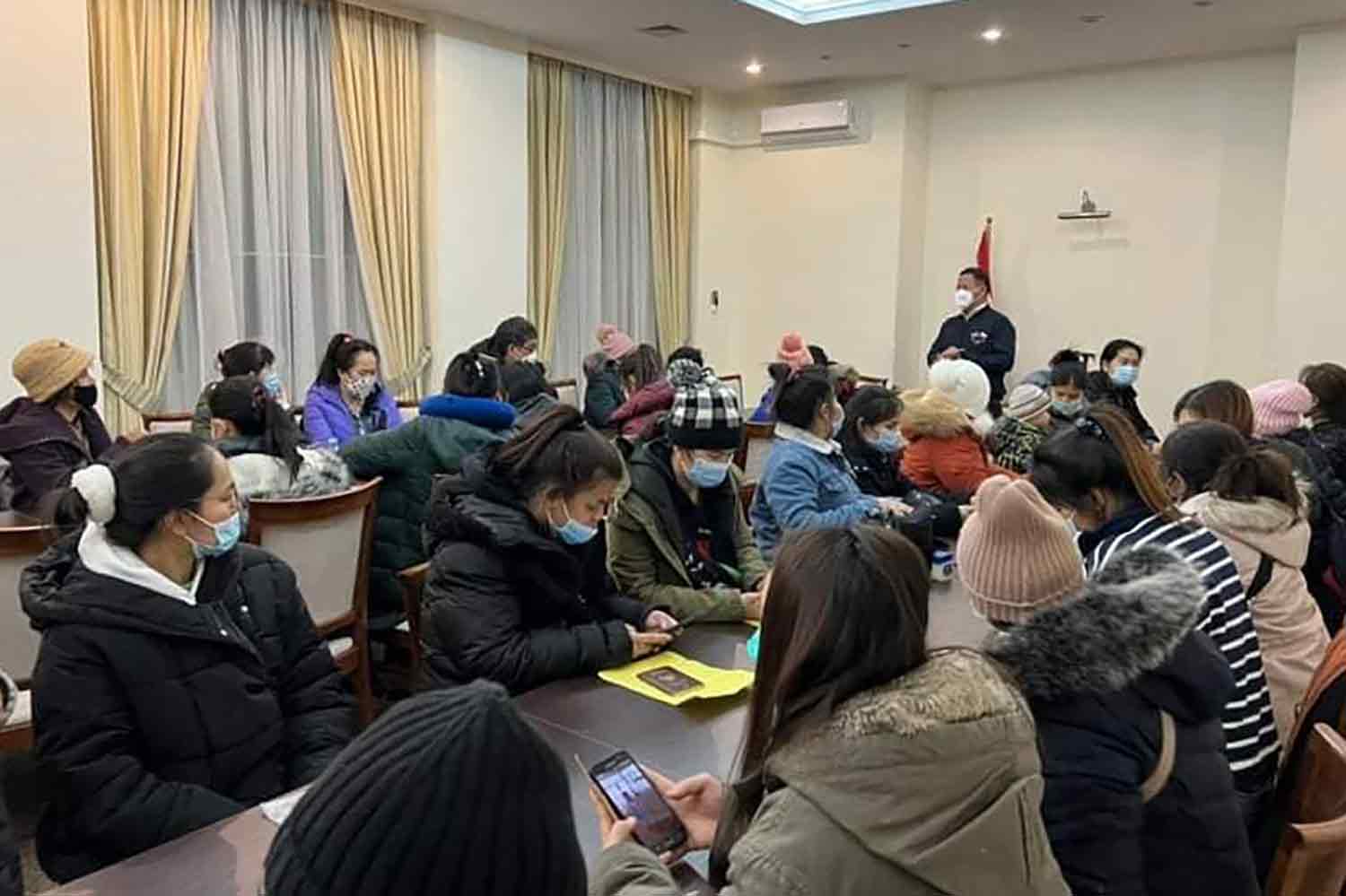 Forty-three Thais arrive at the help centre set up by the Foreign Ministry at a hotel in Lviv, in western Ukraine, on Tuesday. (Photo: Foreign Ministry)