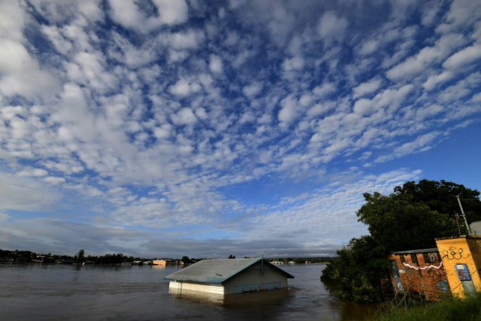 Australians flee floods as toll rises to 12, Sydney on alert - Vimarsana News