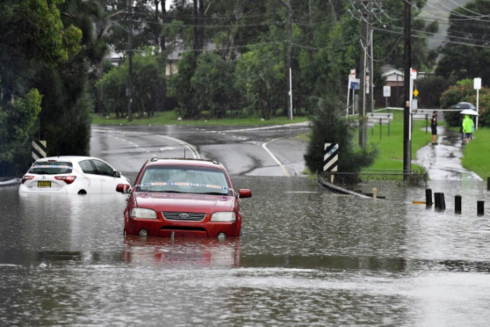 Floods in Australia kill 20 people as thousands flee Sydney thumbnail