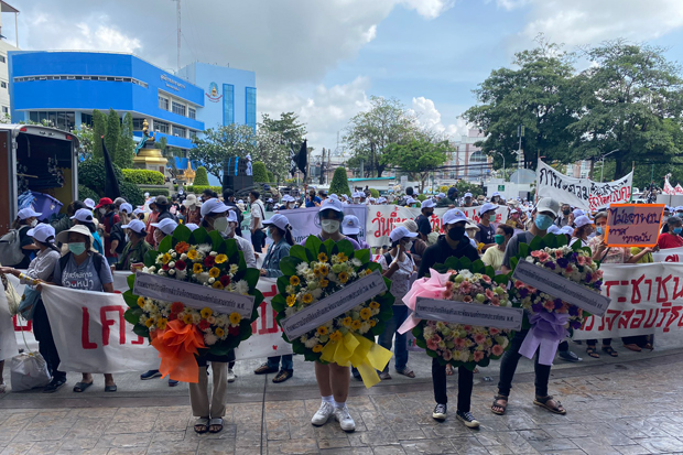 Non-governmental organisations gather at the Social Development and Human Security Ministry on Thursday demanding the dropping of draft legislation that would police their acitivities. (Thai Volunteer Service Twitter account)