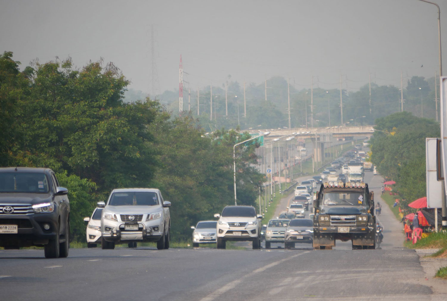 More vehicles are seen on the Northeast-bound Mittraphap Road on Saturday morning as people return to their home provinces for Songkran celebrations. (Photo: Prasit Tangprasert)