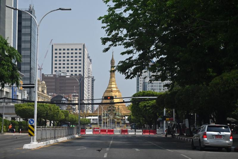 Barricades are seen along a road leading to Sule Pagoda during the Thingyan water festival in Yangon on Wednesday. (AFP photo) Barricades are seen along a road leading to Sule Pagoda during the Thingyan water festival in Yangon on Wednesday. (AFP photo)