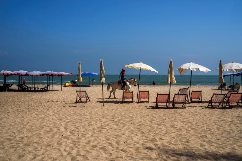 A man rides a horse at Cha-am beach in Phetchaburi province on Dec 25, 2021. (Reuters photo)