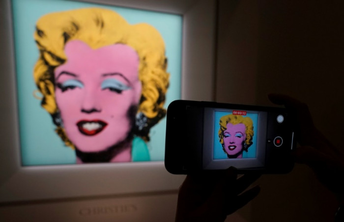 Warhol portrait of Marilyn Monroe fetches record $195m: Christie's - Vimarsana News