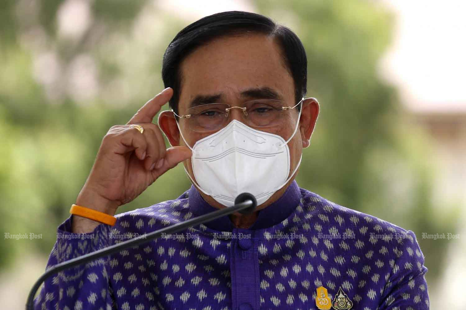 Prime Minister Prayut Chan-o-cha speaks to reporters at Government House on Tuesday. (Photo: Arnun Chonmahatrakool)