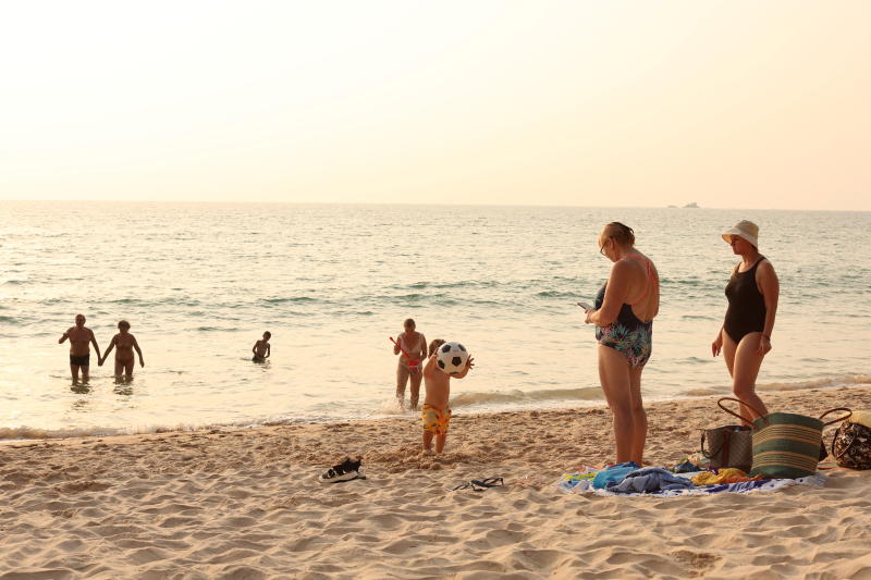 Russian tourists stay at the beach in Phuket on March 12, 2022. (Reuters photo)