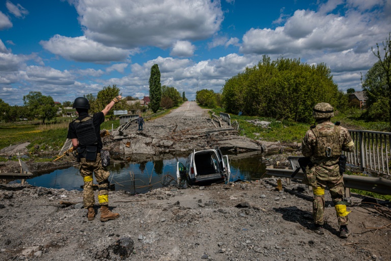 Fear and hope under fire in Ukrainian village near Russian border