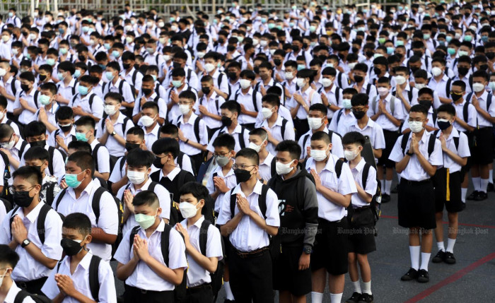Smiles not hugs as classes restart