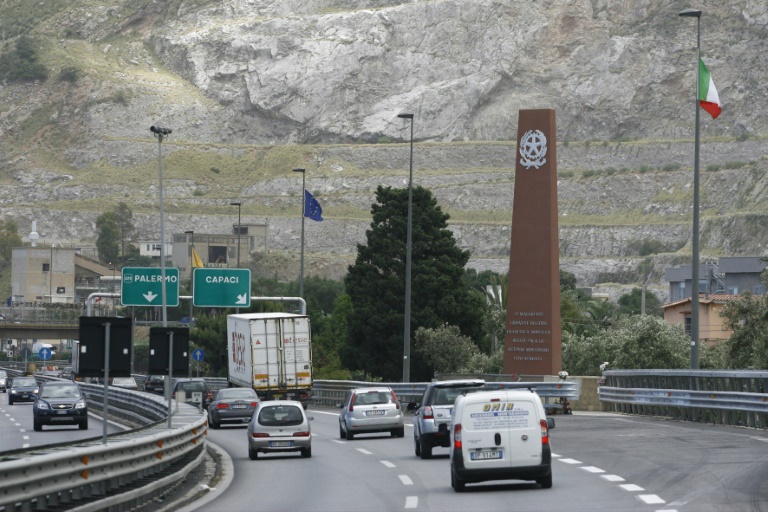 A tall red monument stands at the site of the car bomb attack which killed anti-mafia judge Giovanni Falcone in Palermo in May 1992 A tall red monument stands at the site of the car bomb attack which killed anti-mafia judge Giovanni Falcone in Palermo in May 1992