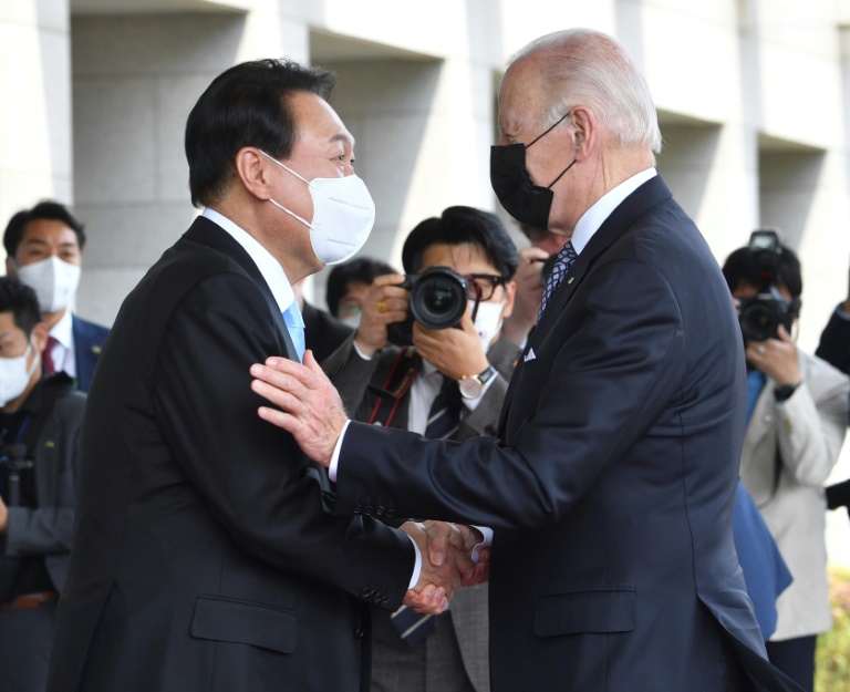 South Korean President Yoon Suk-yeol greets US President Joe Biden in Seoul on Biden's first trip to Asia since taking office. South Korean President Yoon Suk-yeol greets US President Joe Biden in Seoul on Biden's first trip to Asia since taking office.