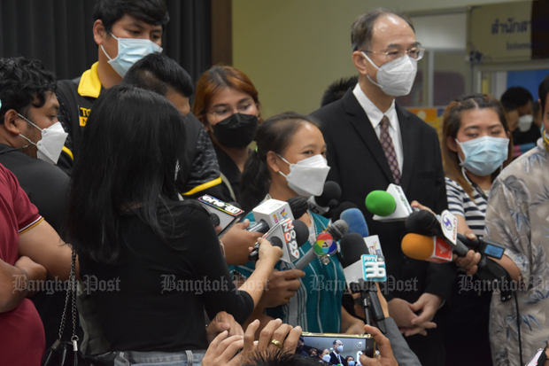 Pinnapa Prueksapan, wife of missing Karen activist Porlajee “Billy” Rakchongcharoen, talks to reporters, with by Surapong Kongjantuk, chairman of the Cross Cultural Foundation, by her side, at the Office of the Attorney-General on Thursday. (Photo: King-oua Laohong)