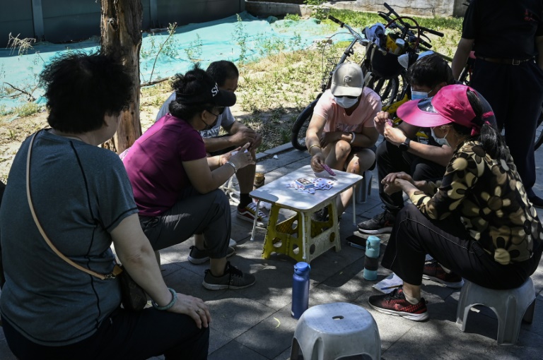 Beijingers are making the most of the small spaces available as China's coronavirus controls close in Beijingers are making the most of the small spaces available as China's coronavirus controls close in