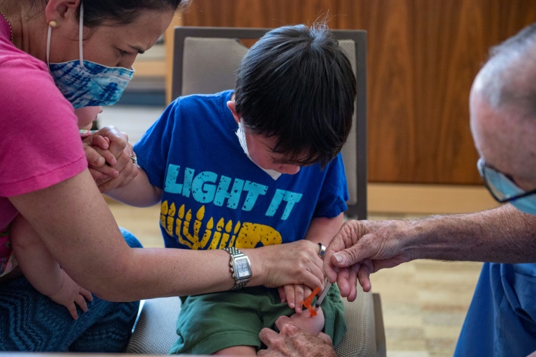 A three year old receives his Covid-19 vaccination, with Moderna, at Temple Beth Shalom in Needham, Massachusetts on June 21, 2022. A three year old receives his Covid-19 vaccination, with Moderna, at Temple Beth Shalom in Needham, Massachusetts on June 21, 2022.