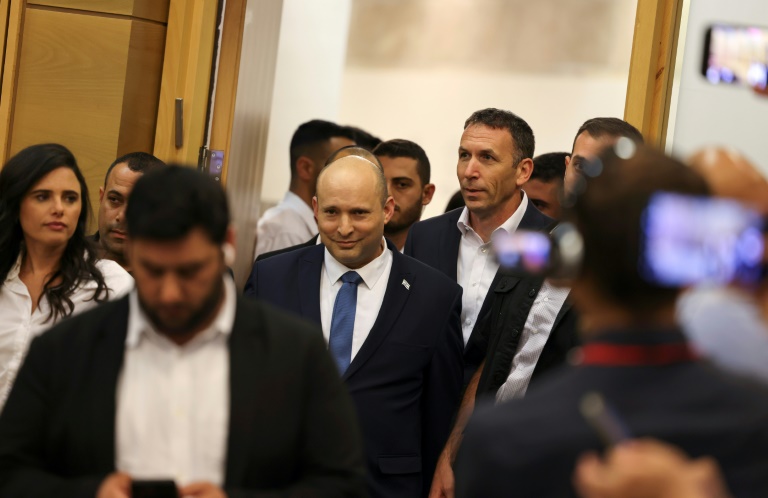 Israel's outgoing Prime Minister Naftali Bennett arrives to address lawmakers from his Yamina party at the Israeli parliament Israel's outgoing Prime Minister Naftali Bennett arrives to address lawmakers from his Yamina party at the Israeli parliament