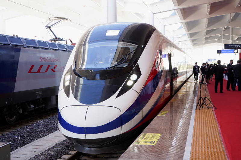 FILE PHOTO: A train is seen during the handover ceremony of the high-speed rail project linking the Chinese southwestern city of Kunming with Vientiane, in Vientiane, Laos, Dec 3, 2021. The government said it will complete its part of a much-delayed high-speed rail system linking the country to China through Laos by 2028. (Reuters)