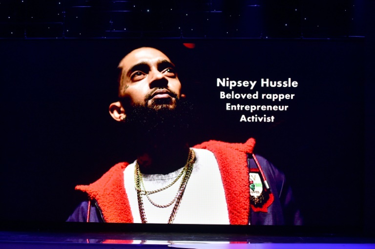 The month after his 2019 killing, thousands of people gathered for a service in Nipsey Hussle's honor, with Stevie Wonder and Snoop Dogg among those paying tribute The month after his 2019 killing, thousands of people gathered for a service in Nipsey Hussle's honor, with Stevie Wonder and Snoop Dogg among those paying tribute
