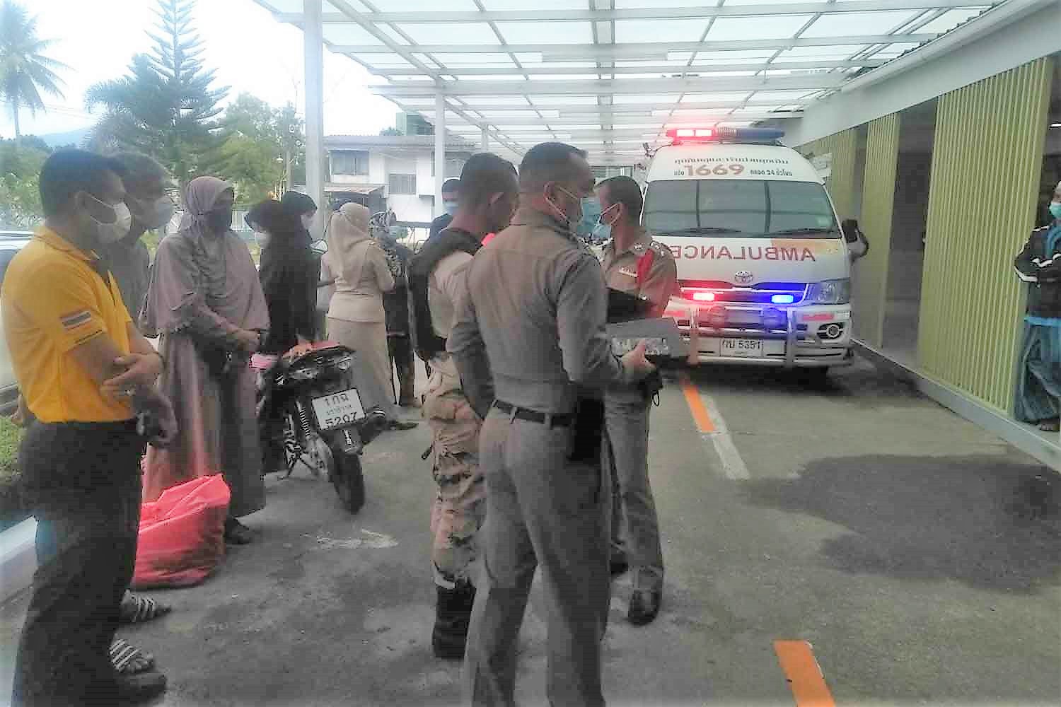 Villagers gather in front of Mai Kaen Hospital in Pattani where two tambon security volunteers injured by a bomb explosion were admitted for treatment on Tuesday morning. (Photo: Abdullah Benjakat)