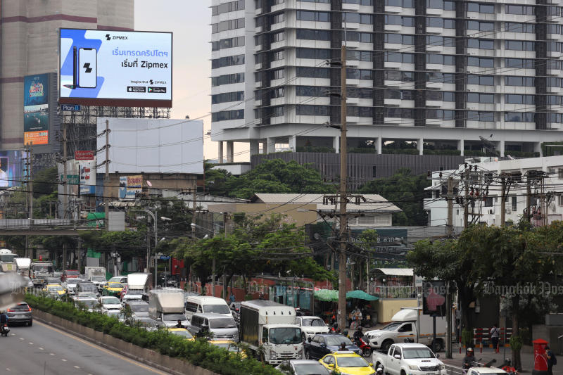 A billboard promoting the Zipmex app is seen above a street in Bangkok earlier this year. (File photo: Bangkok Post)