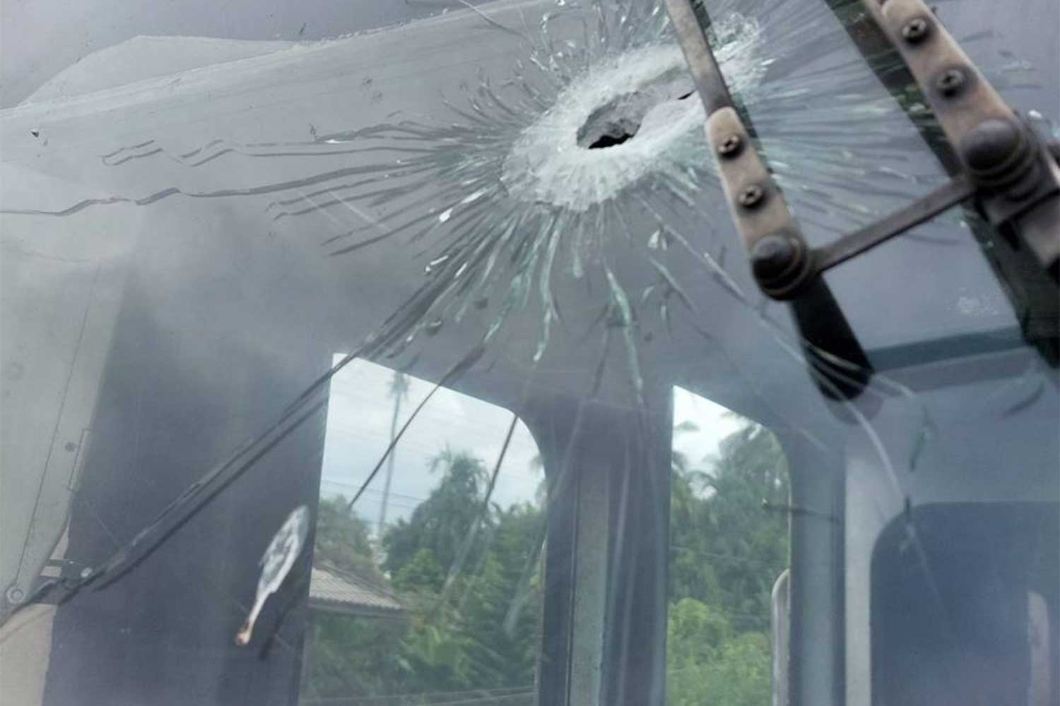 One bullet hits the locomotive's window of a Sungai Kolok-bound passenger train on Thursday. No injuries were reported. (Photo: Waedao Harai)