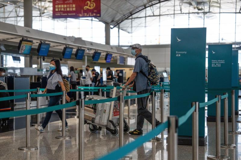 Travellers are seen at the departure hall of Hong Kong International Airport on Monday. Bangkok is the most popular destination for online searches on flights out of Hong Kong. (Bloomberg photo)