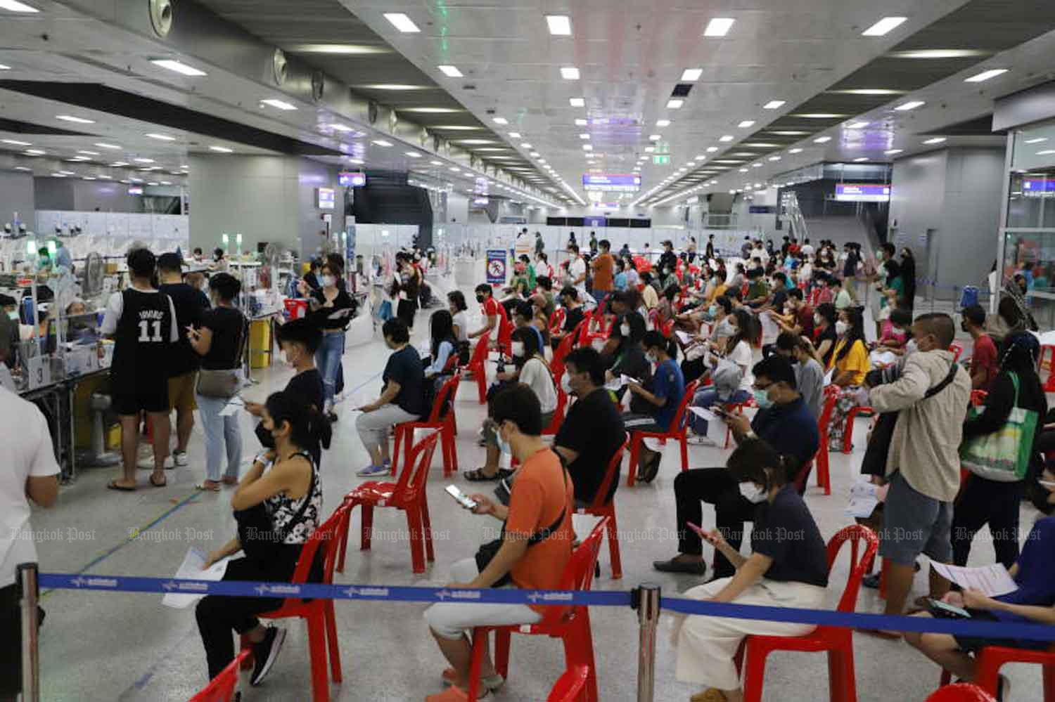 People gather for Covid-19 vaccination at Bang Sue Grand Station in Bangkok last month. (Photo: Wichan Charoenkiatpakul)