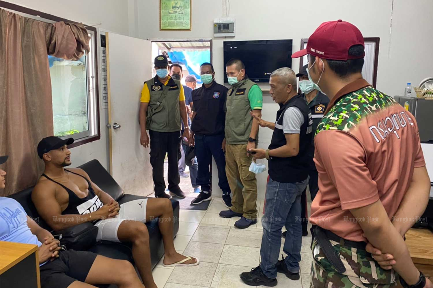 Roslan Bendenia, 22, from the Netherlands, is arrested on a charge of illegally spearing endangered parrotfish inside Mu Koh Phi Phi National Park in Krabi province. (Photo: Phuket Tourist Police)