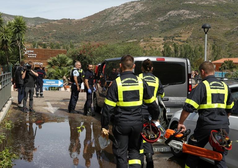 Rescue workers at a campground in Coggia, Corsica, where a 13-year-old girl was killed Thursday when a tree fell on her bungalow. Rescue workers at a campground in Coggia, Corsica, where a 13-year-old girl was killed Thursday when a tree fell on her bungalow.