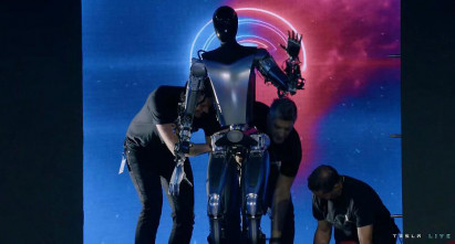 Tesla shows off latest robot prototype Optimus boasts opposable thumbs as Musk touts progress