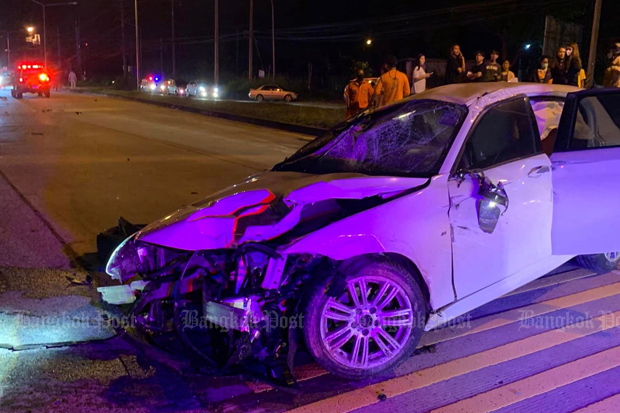 The wreckage of the BMW driven by a 15-year-old boy is seen after it hit a newly-graduated student at Suranee University of Technology in Muang district of Nakhon Ratchasima on Friday night. (Photo: Prasit Tangprasert)