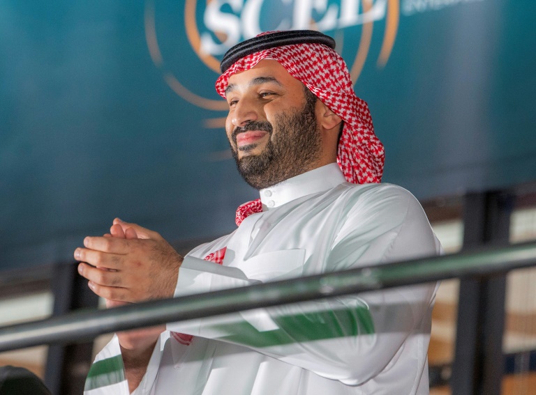 Lawyers for Saudi Crown Prince Mohammed bin Salman -- seen here in a handout photo from a boxing exhibition in August 2022 -- have argued that his recent appointment as prime minister should shield him from US legal liability. Lawyers for Saudi Crown Prince Mohammed bin Salman -- seen here in a handout photo from a boxing exhibition in August 2022 -- have argued that his recent appointment as prime minister should shield him from US legal liability.