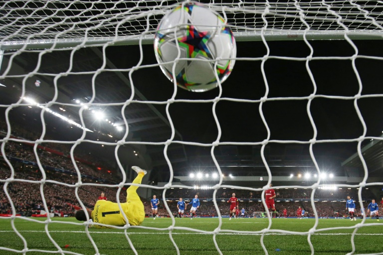 Mohamed Salah fires past Rangers' goalkeeper Allan McGregor for Liverpool's second goal on Tuesday. Mohamed Salah fires past Rangers' goalkeeper Allan McGregor for Liverpool's second goal on Tuesday.