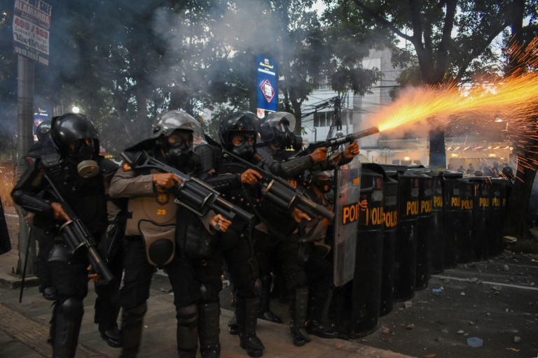 Indonesian police have spent millions on tactical gear including gas masks and batons. Indonesian police have spent millions on tactical gear including gas masks and batons.