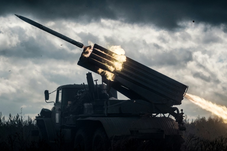 A multiple rocket launcher fires a rocket towards Russian positions in Ukraine's region of Kharkiv. A multiple rocket launcher fires a rocket towards Russian positions in Ukraine's region of Kharkiv.