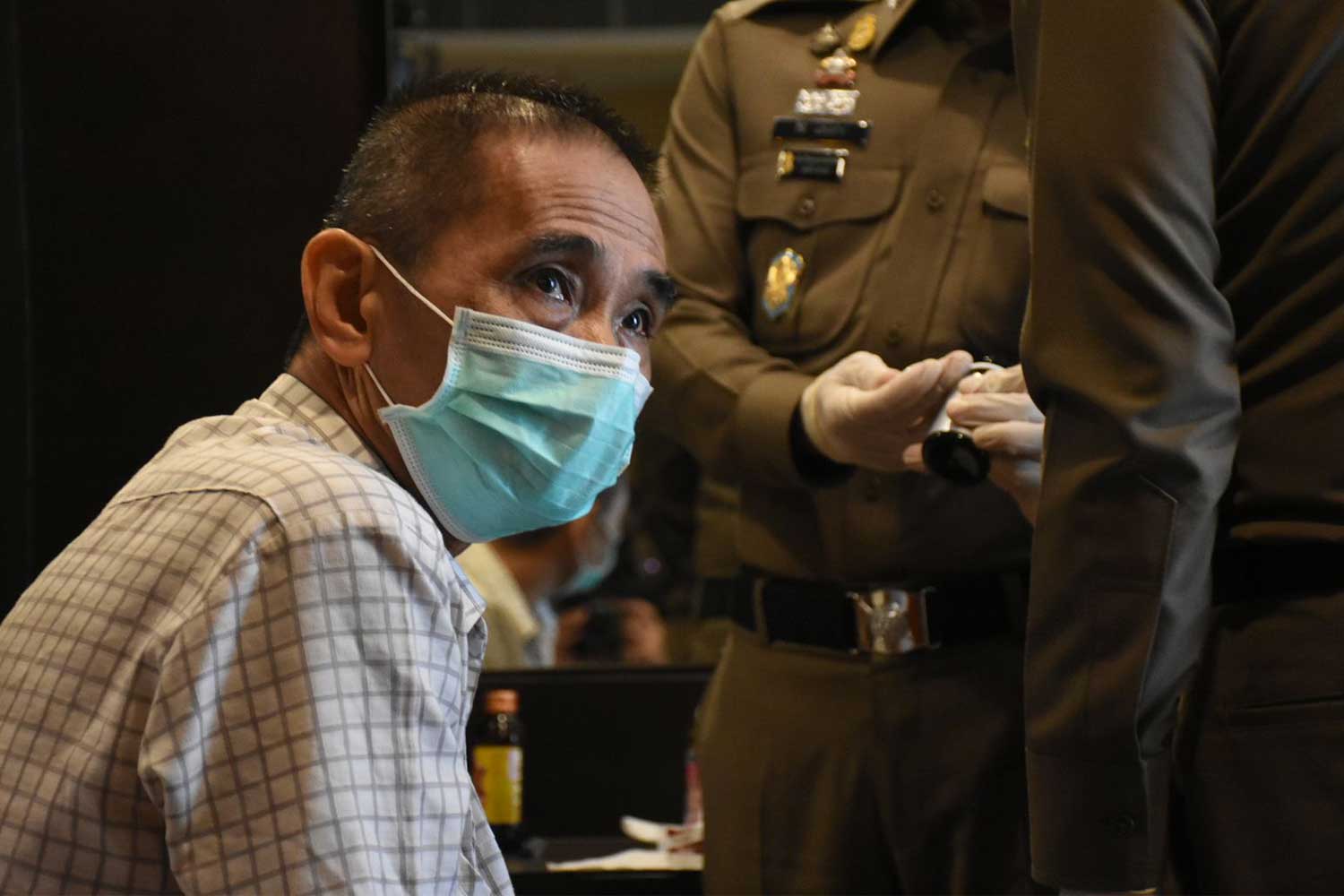 Low Gin Ang, 53, is one of two Singaporeans arrested in front of a hotel in Din Daeng for allegedly selling drugs to foreign and Thai pub-goers. (Photo supplied/Wassayos Ngamkham)