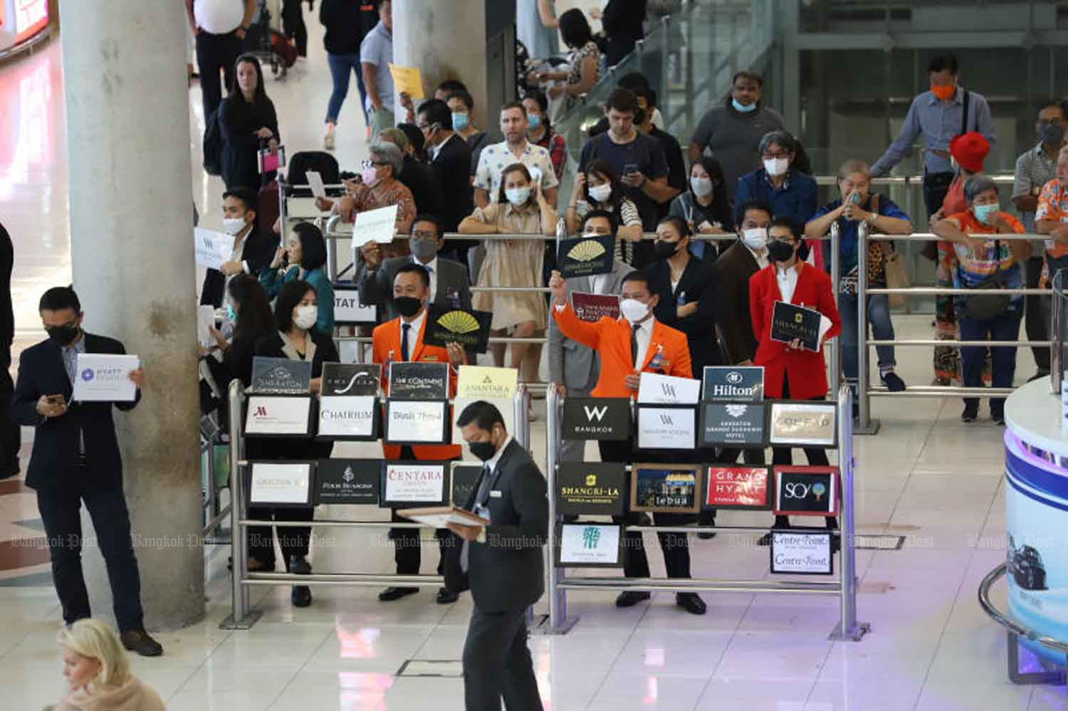 People wait for arrivals at Suvarnabhumi airport on Thursday. (Photo: Varuth Hirunyatheb)