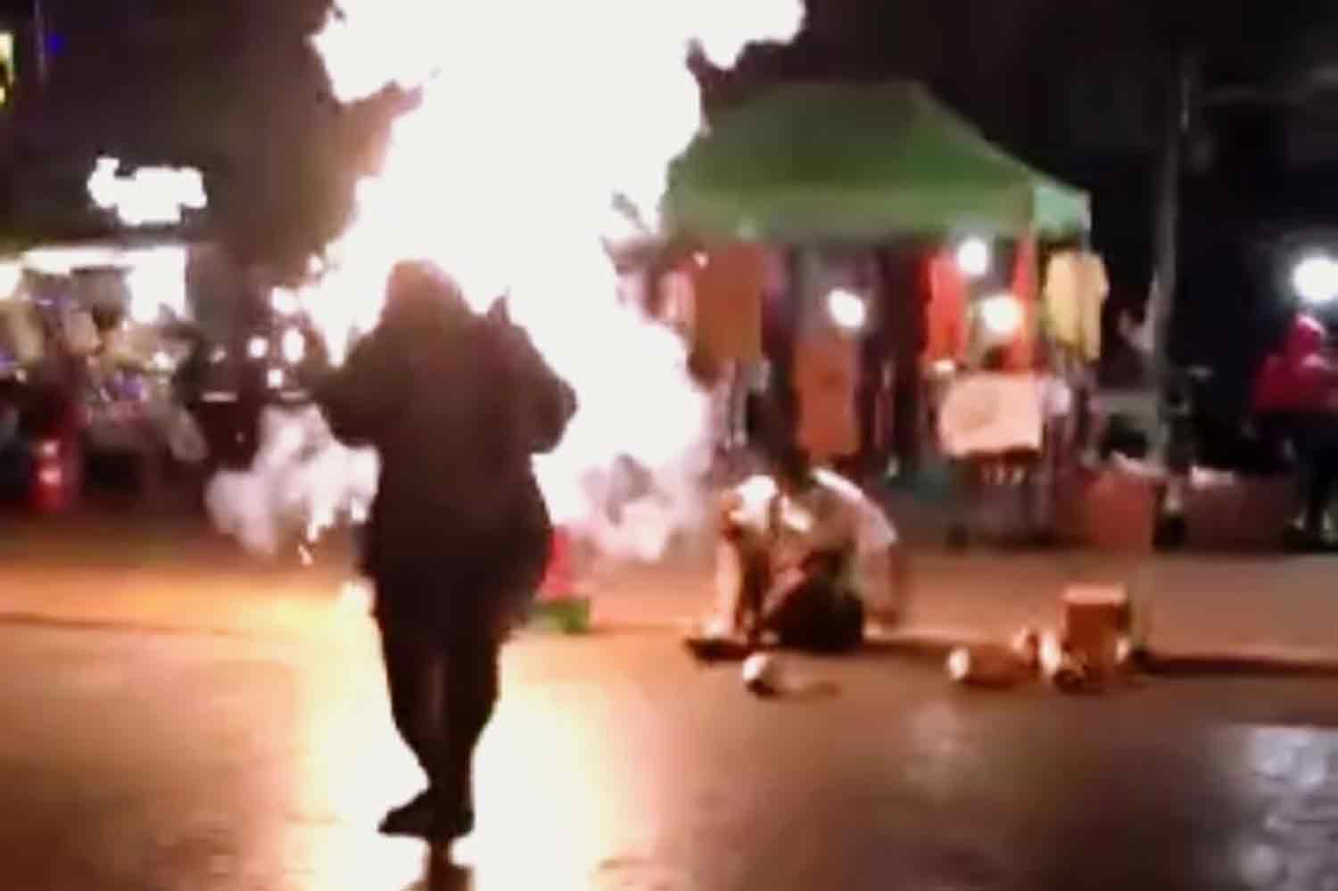 A firework explodes on the ground after the opening ceremony of the Loy Krathong festival in Muang district of Nakhon Phanom on Tuesday night. Twelve people suffered minor burns. (Photo: Pattanapong Sripiachai)