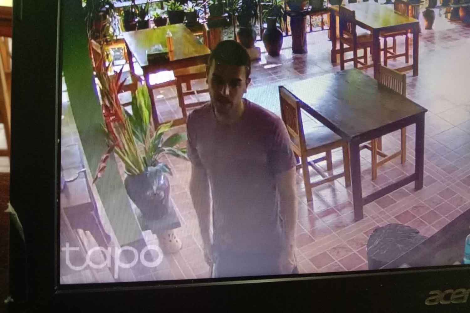 French tourist Gollio Cyrit Tizzlano, seen in a security camera recording at Khao Sok Holiday Resort in Phanom district, Surat Thani province, before going missing. (Photo: Supapong Chaolan)