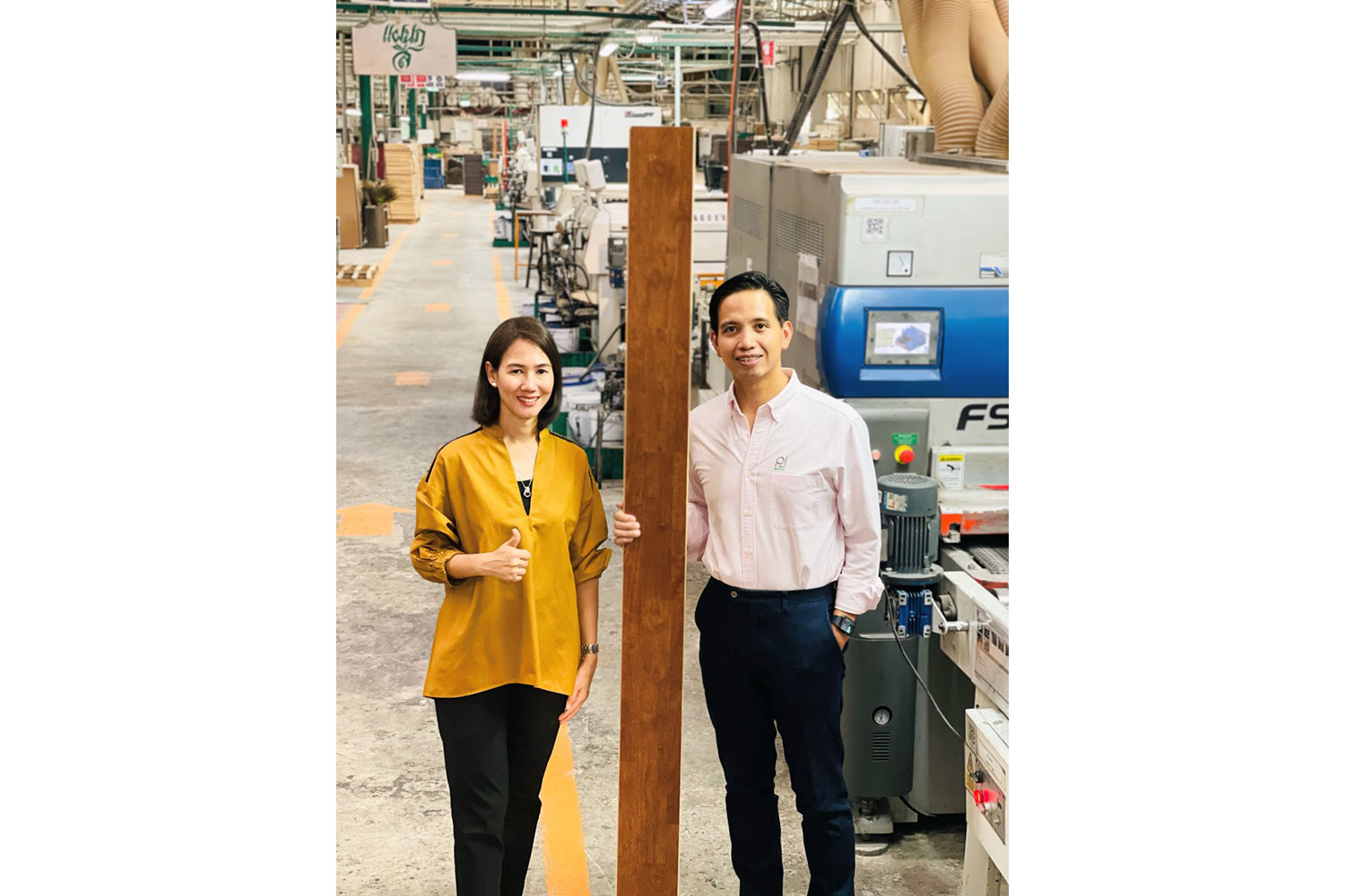 Mrs. Buse de Jesus and Mr. Andrew de Jesus presenting PJ Chonburi Parawood Co., Ltd., solid wood flooring production line