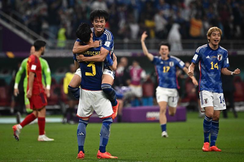 Japan's players react after the Qatar 2022 World Cup Group E football match between Japan and Spain at the Khalifa International Stadium in Doha on Thursday. (AFP photo)